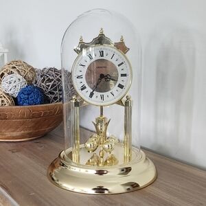 Chronos Glass Dome Anniversary Clock, Rotating Pendulum Gold Mantel Clock